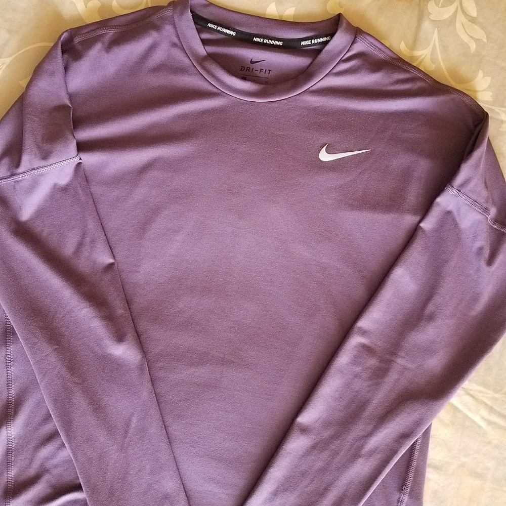 Women's Nike Dri-fit long sleeve running top.